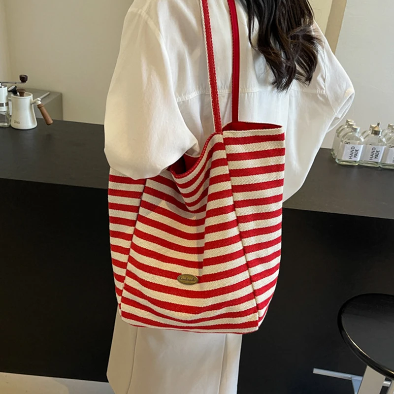 

Women's bag, large capacity shoulder bag, student bag, stylish casual striped tote bag, hand-held diagonal cross bag