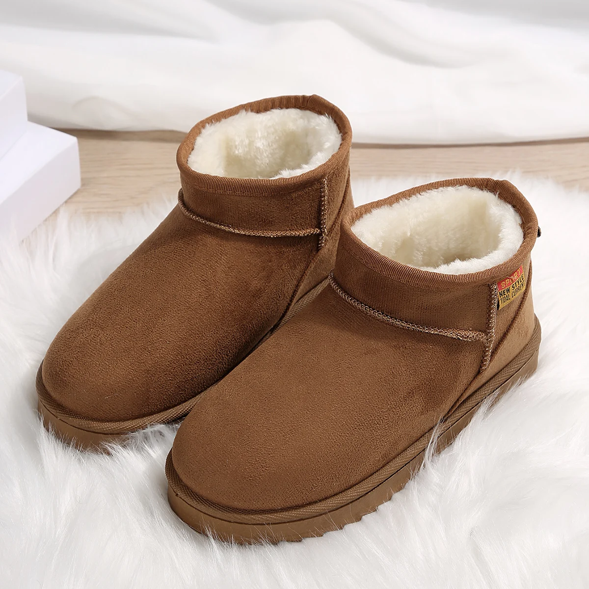 Snowshoe woman fur one of the new fashion short tube thicken warm cotton shoes lovers