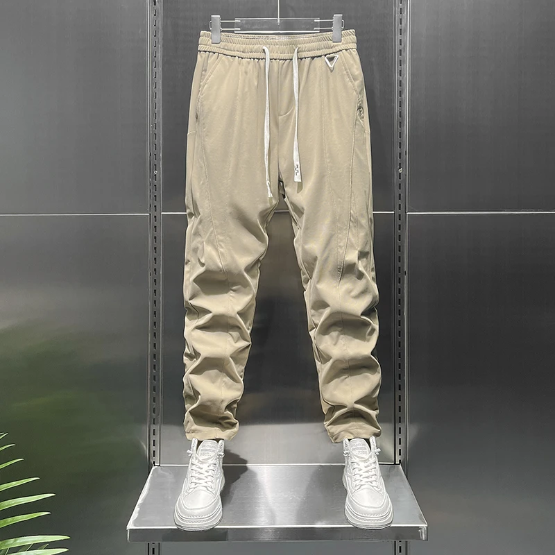 Summer tapered light business casual pants for men with elastic waist elastic knit loose fit and versatile cropped pant