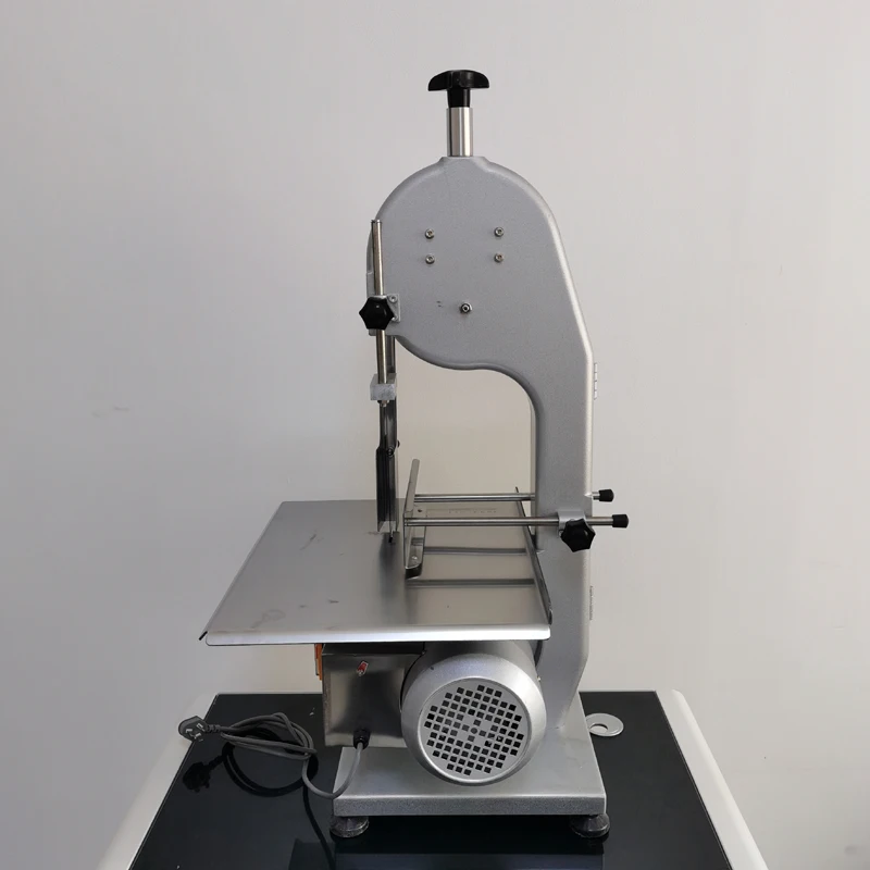 

New electric industrial stainless steel adjustable motor 220V semi automatic bone saw cutting machine for frozen meat band saw