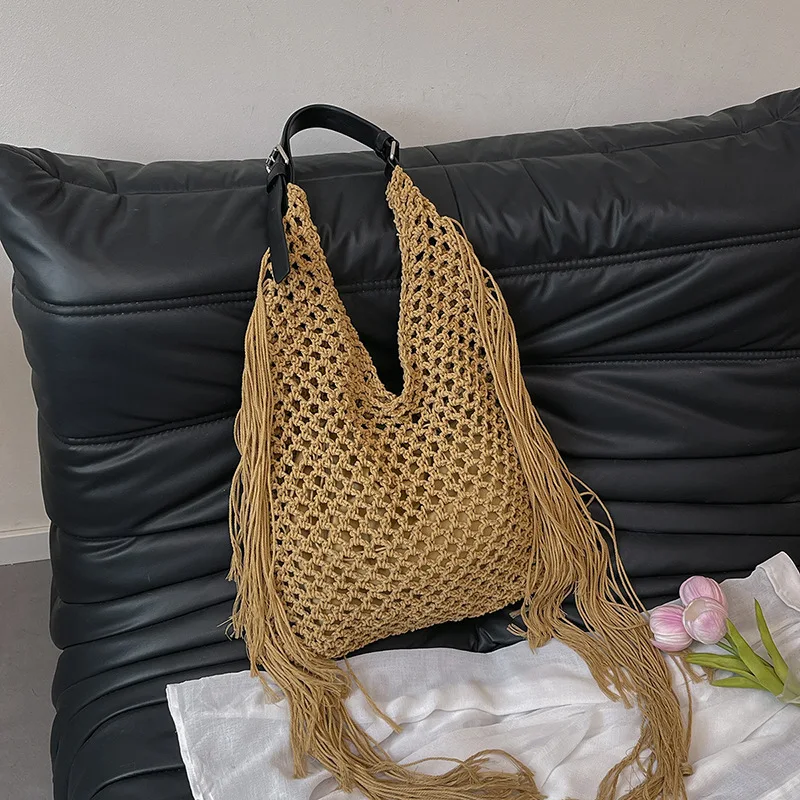 

2025 Summer Tassel Shoulder Bags Hollow Out Weaving Tote Bags For Women Luxury Beach Vacation Handbags Travel Shoulder Bag