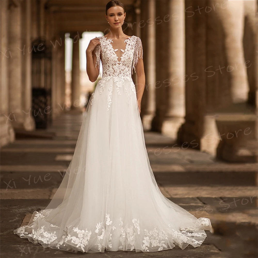 Sexy alla moda con scollo A V una linea abiti da sposa da donna eleganti Appliques abiti da sposa in pizzo senza maniche Backless Vestido De Noivas