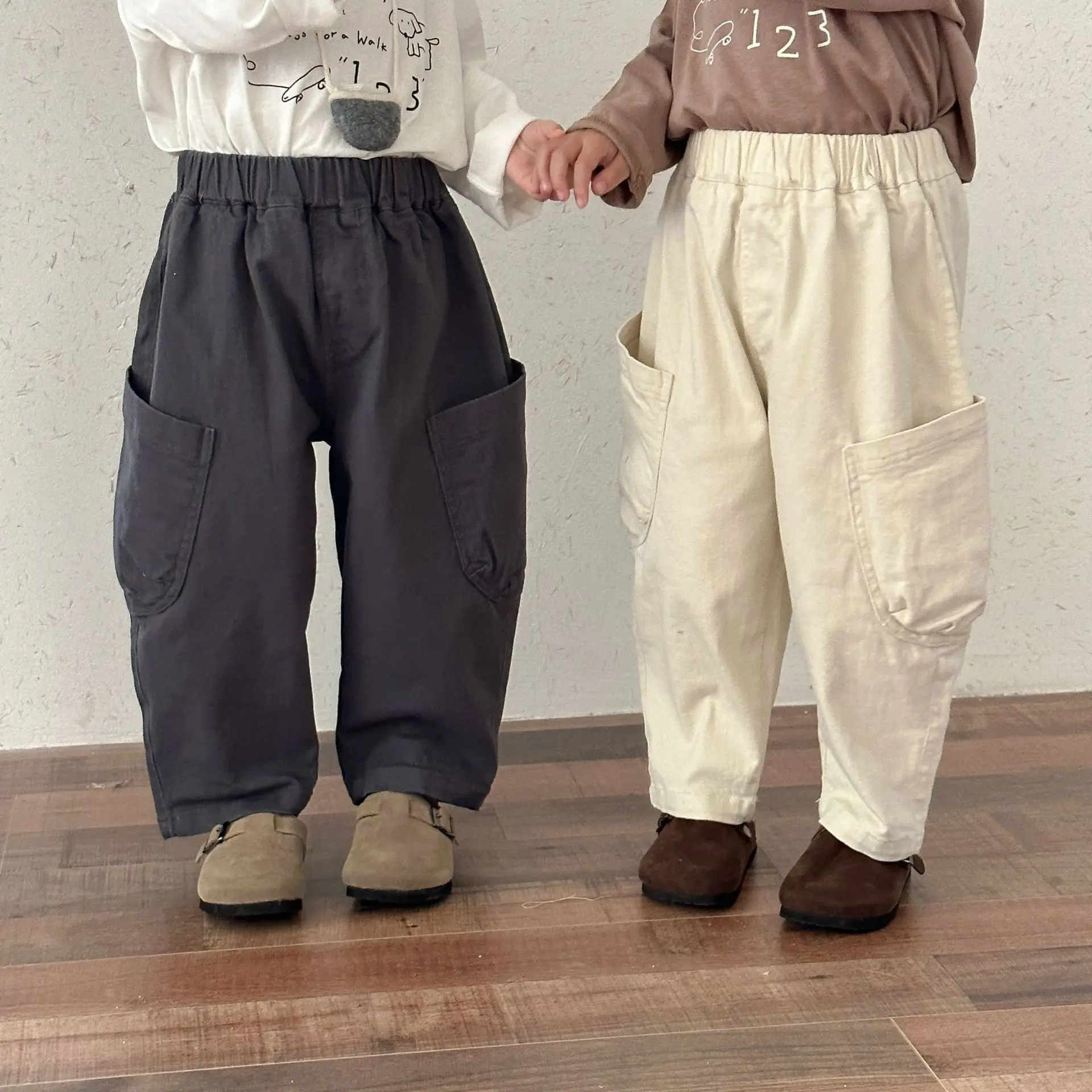 2025 nueva primavera otoño niños pantalones elásticos sueltos sólidos bolsillo algodón bebés pantalones casuales niños pantalones