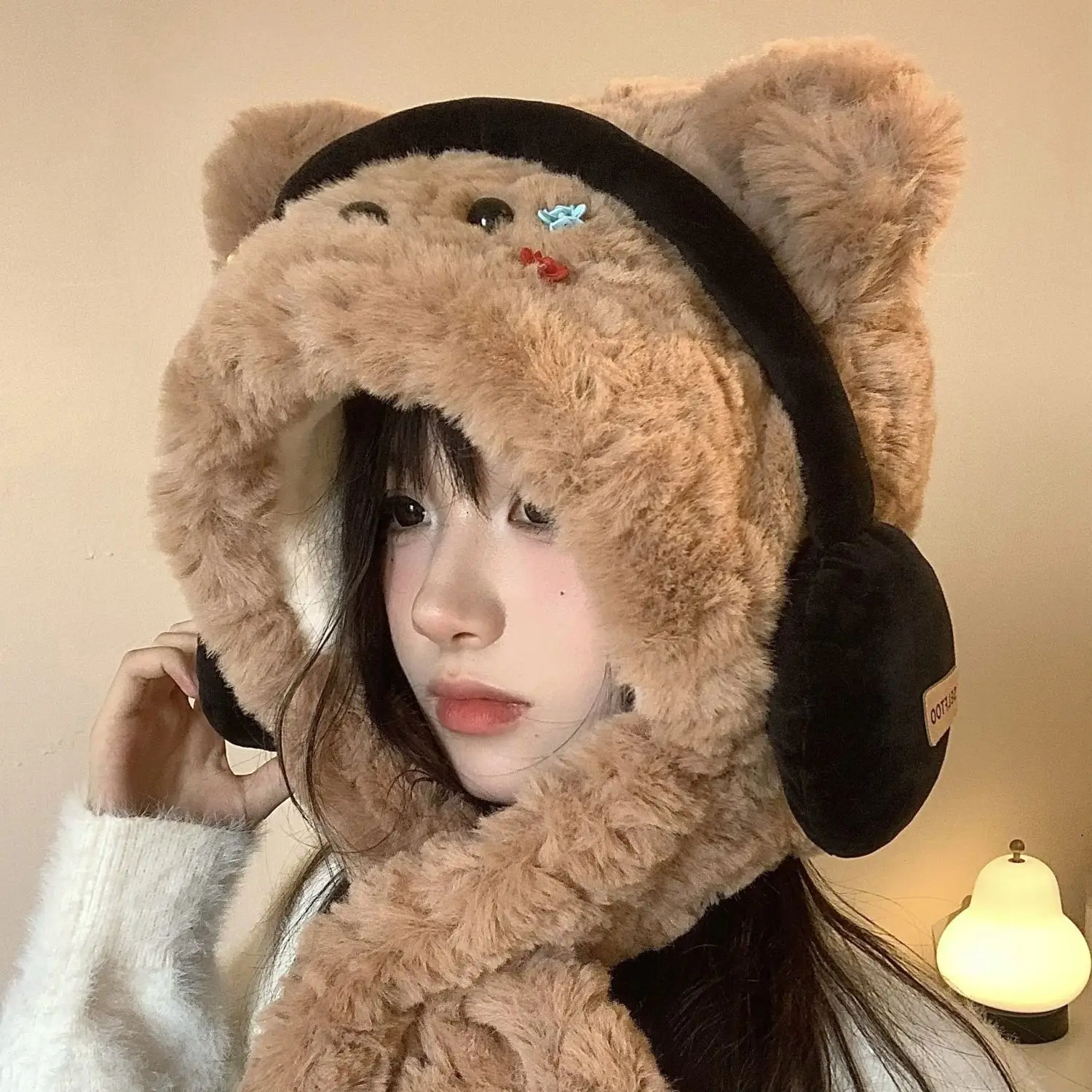 

New earphones, puppy hat, scarf, integrated cold-proof and warm hooded scarf, thickened ear protectors, plush cap.