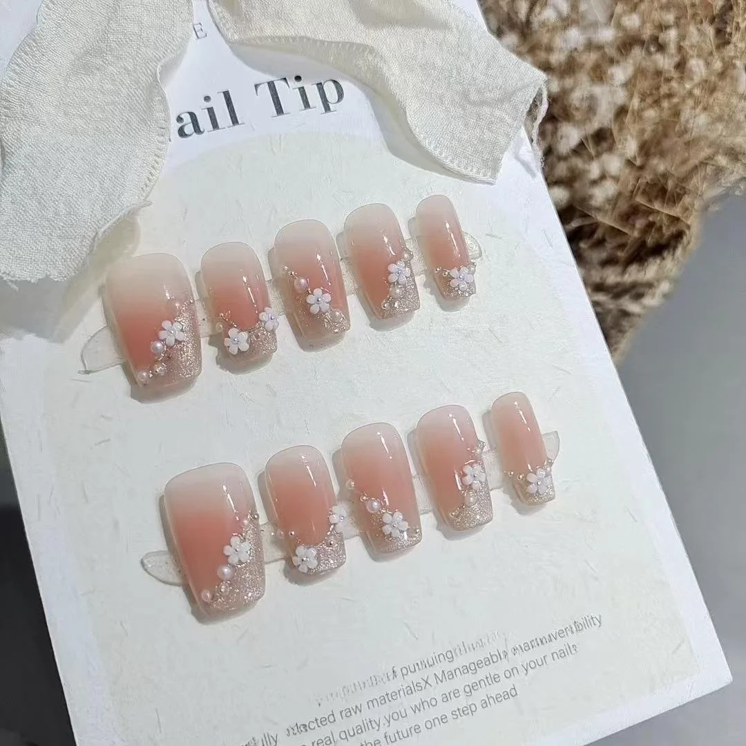 unhas-posticas-reutilizaveis-10-pecas-s202-ponta-afiada-pequena-flor-curta-degrade-branco-puro-com-pedras-de-cristal-para-olhos
