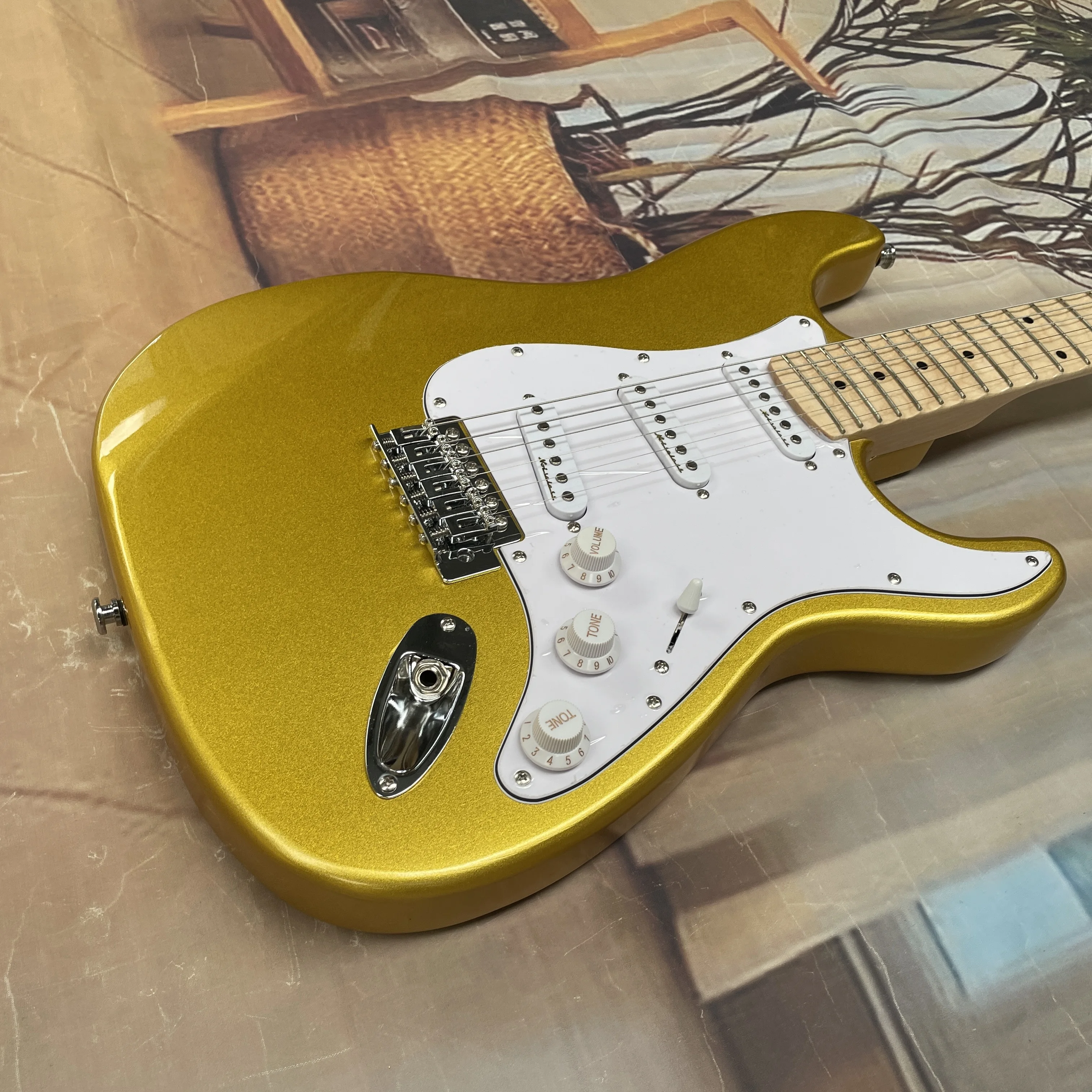 جيتار كهربائي ذهبي اللون بستة  - مراجعة Electric Guitar Beginner وسعره