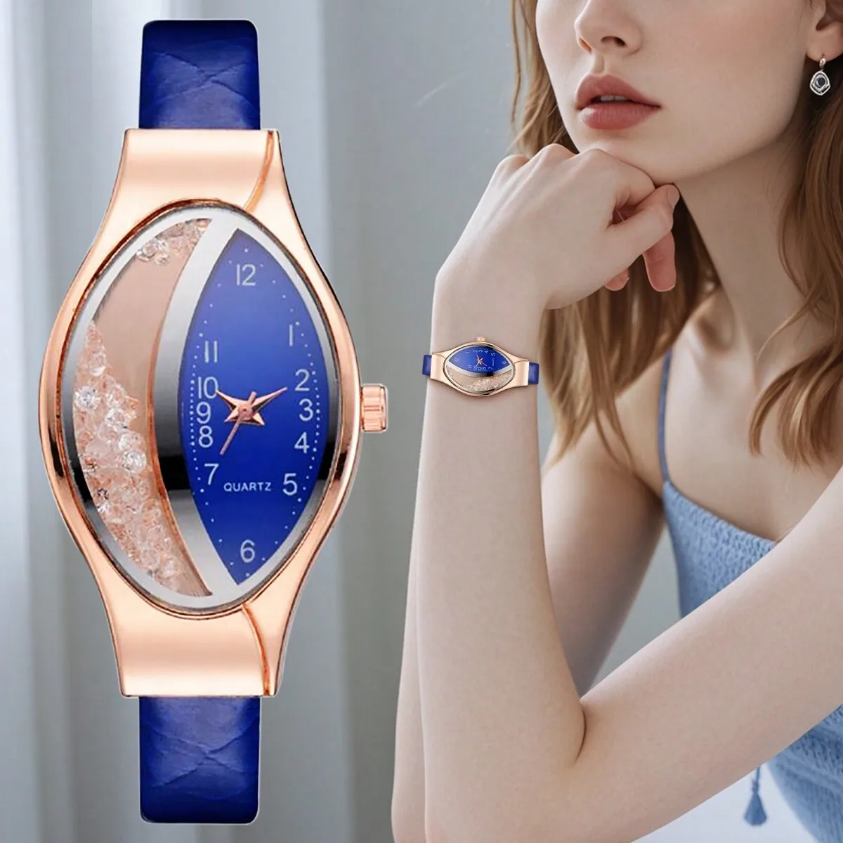 

Элегантные женские кварцевые часы эллиптической формы с акцентами из страз и синим кожаным ремешком.