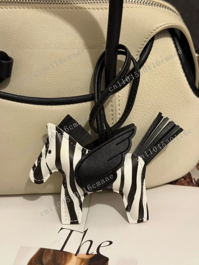 

Internet celebrity pony pendant PU leather car keychain he is 4 little pegasus bag pendant bag pendant ultra light