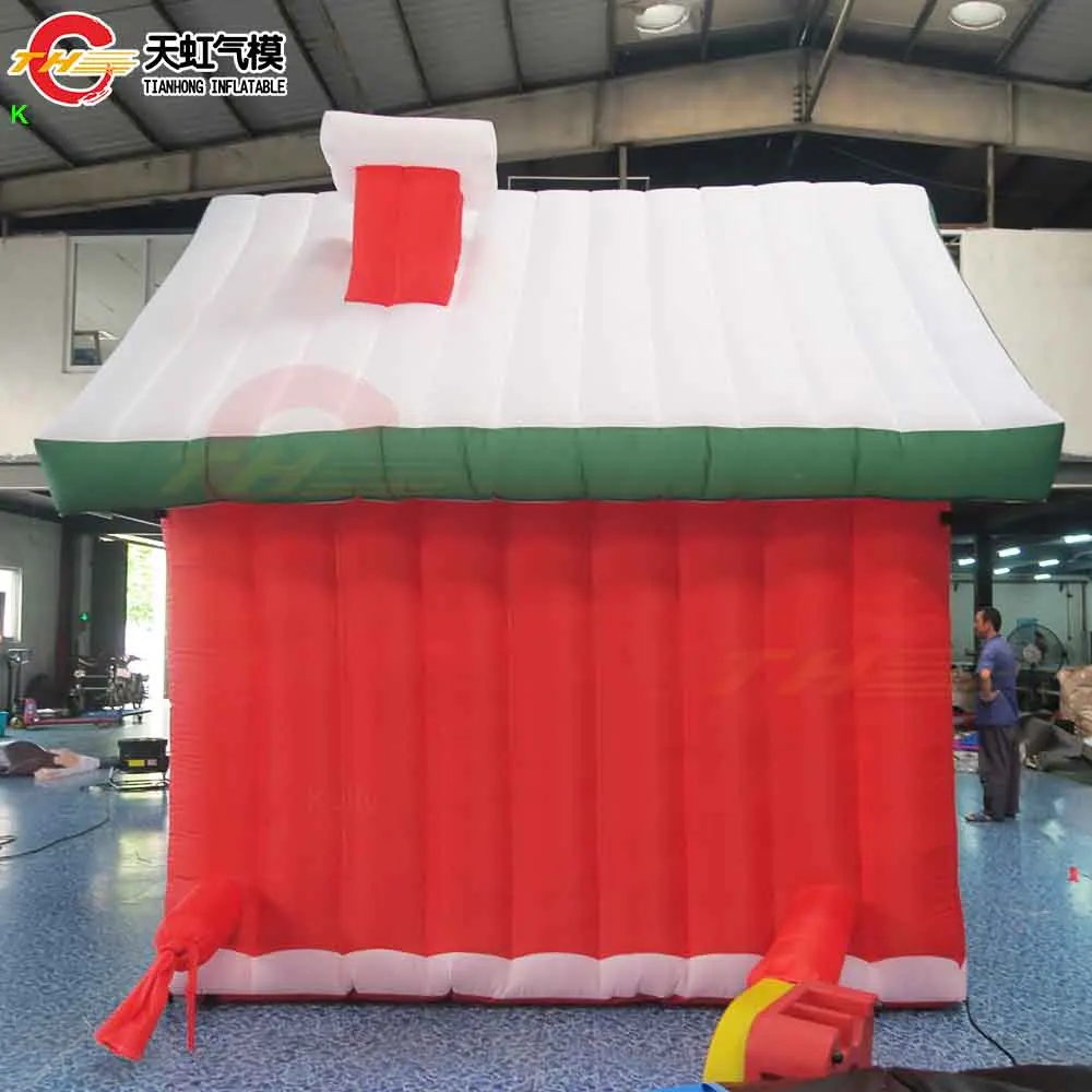 Snelle verzending 7x3m/8x4m opblaasbaar kersthuis met kerstman gigantisch opblaasbaar kersthuis met hek te koop