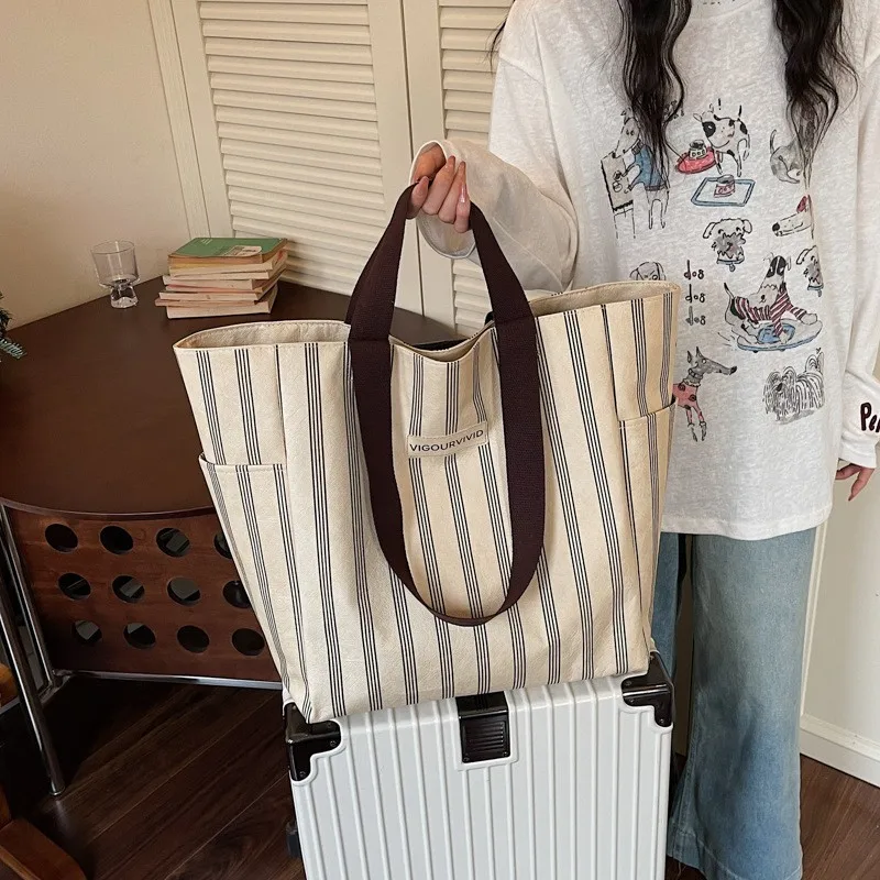 high-end-striped-large-capacity-tote-bag-women's-2026-new-commuter-casual-single-shoulder-shopping-bag-fashionable-sewing-line
