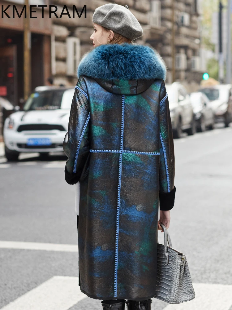 เสื้อโค้ทขนแกะแท้ KMETRAM พร้อมปกขนสุนัขจิ้งจอก เสื้อผ้าสำหรับผู้หญิง สีดำ แบบยาว มีฮู้ด เสื้อคลุมกันหนาว ปี 2025 fourrures