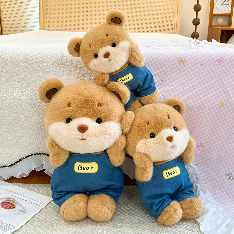 

Soft Fluffy Teddy Bear Plush, Cute Bear Stuffed Animal in Denim Overalls with "Bear" Patch for Gifts.
