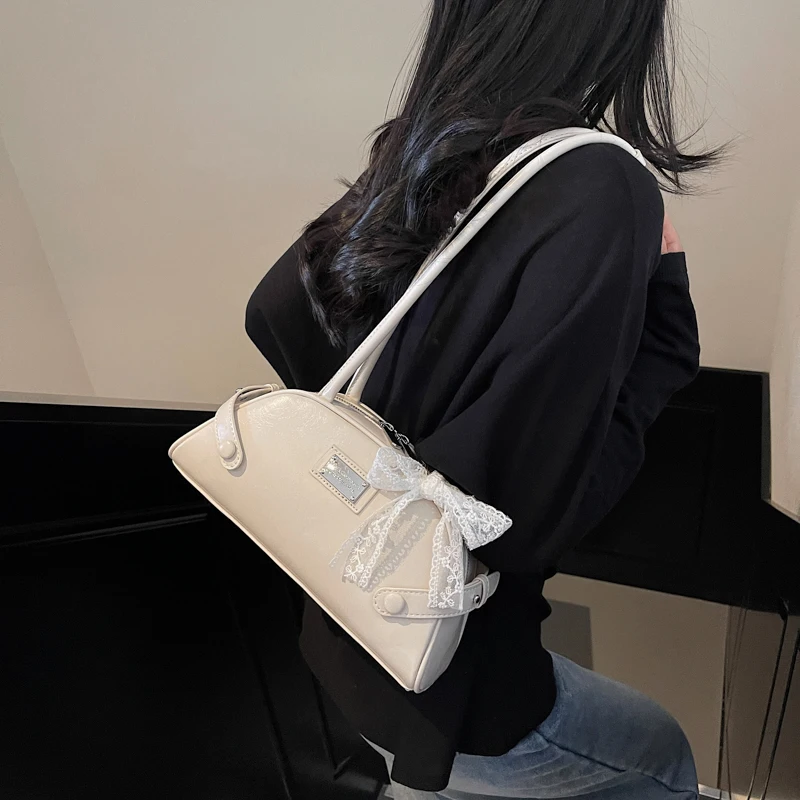 المرأة حقيبة كتف بسيطة بولي Leather الجلود القوس الترفيه الإبط حقيبة يد بلون السفر تحت الإبط حقيبة يد الفتيات في الهواء الطلق حقيبة يومية