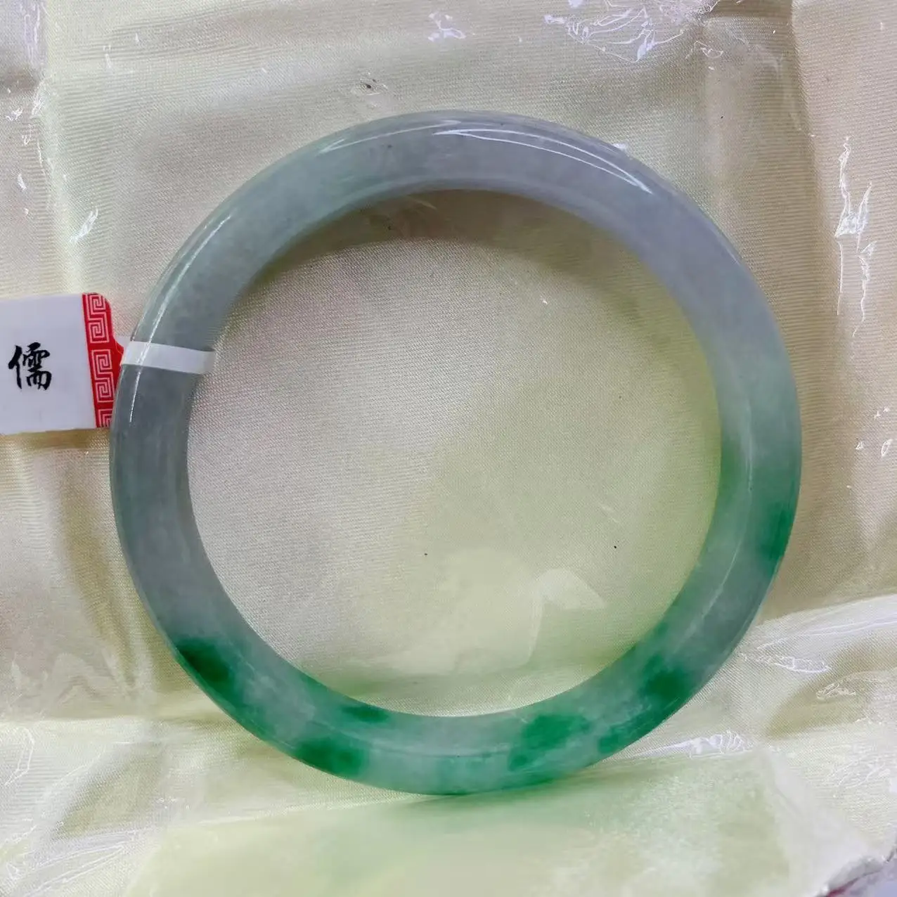 

Physical shooting of natural jade bangle, large two tone 63mm