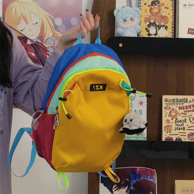 NewinsCasual backpack with simple color matching, kindergarten school bag for boys and girls, lightweight and burden-reducing ou