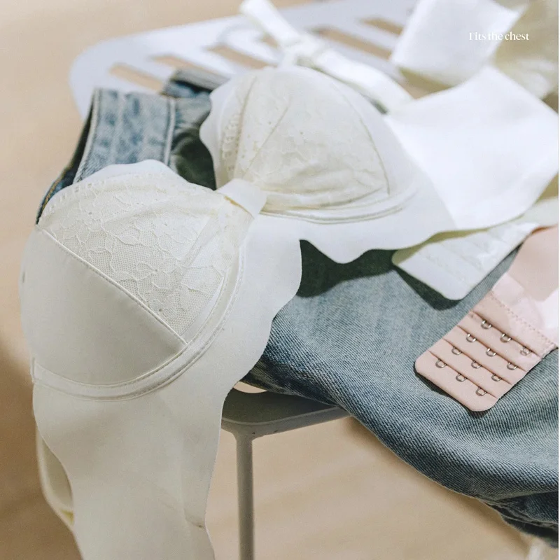 Reggiseno a mezza coppa in pizzo per donna con seni piccoli che mostra un set di reggiseno push-up sexy anti-cedimento con coppia grande e chiusa