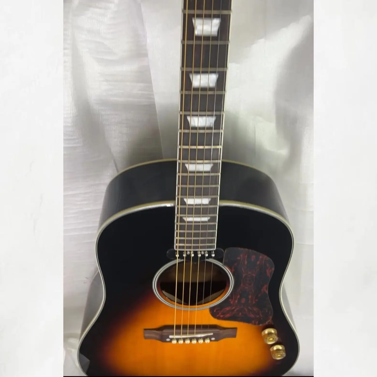 The New J-160 Acoustic Guitar Features A Gradient Chocolate Colored Spruce Top 6-series Folk Style, Making It A Perfect Gift
