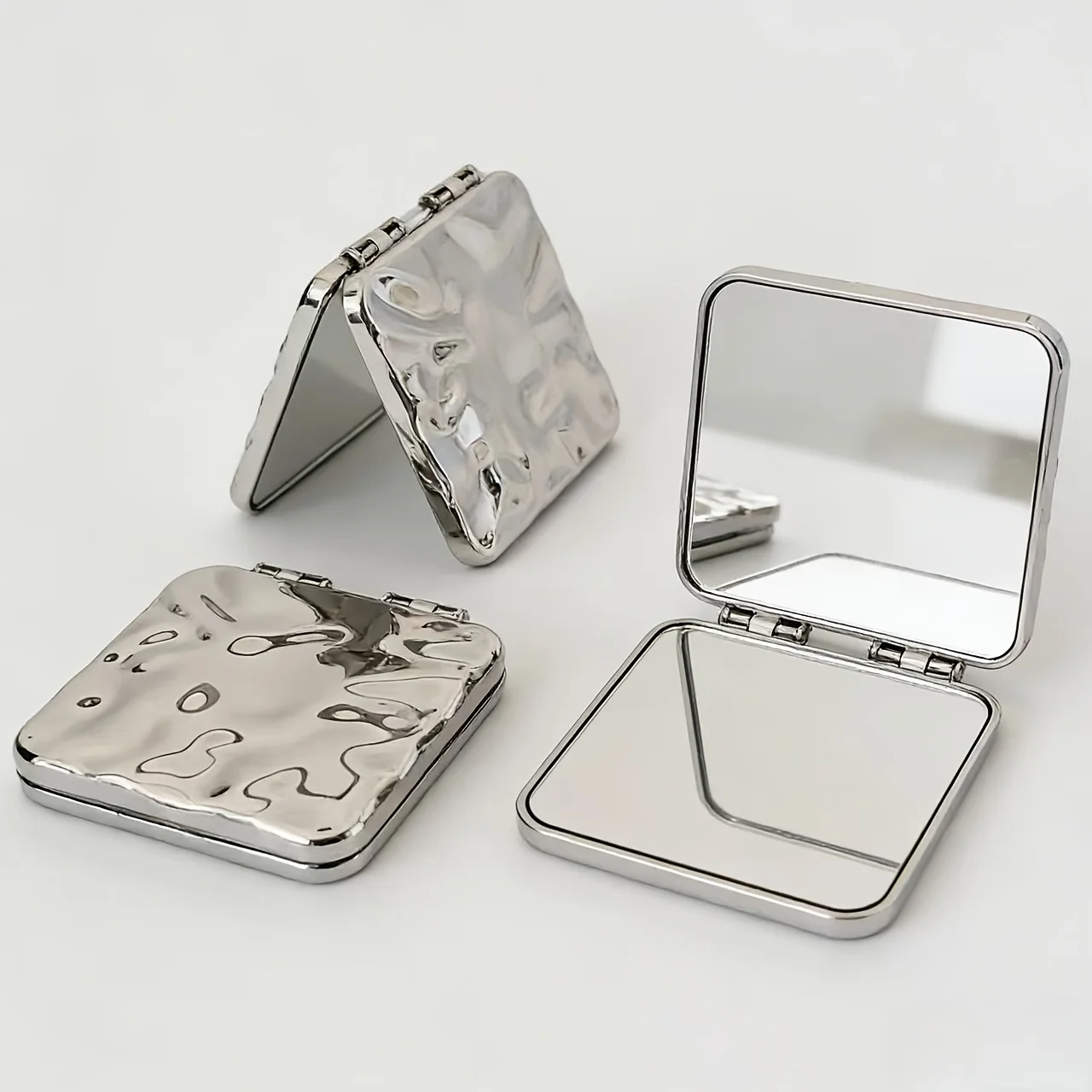 A Double-Sided Folding Mirror with High-Definition Surface, a Portable Makeup Mirror, a Handheld Mirror