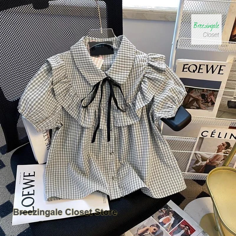 

French advanced design bow polo doll top female summer new temperament sweet lotus leaf bubble sleeve dopamine womens tops