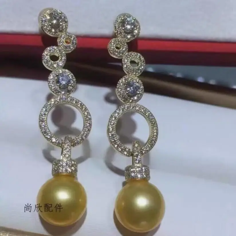 

Великолепные круглые золотые висячие серьги с жемчугом Южного моря 10-11 мм 9-10 мм 925s