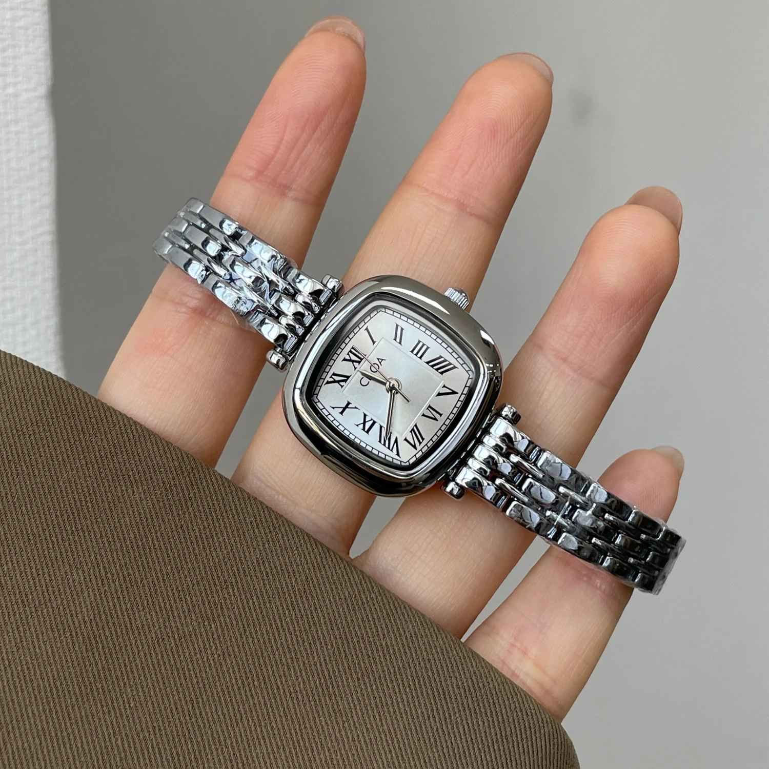 

Часы CILOA, высококачественные женские часы, брендовые, из настоящего серебра, квадратные, маленькие, изящные, роскошные, подарочные, водонепроницаемые, высококлассные кварцевые часы.