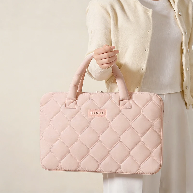 The Soft and Stylish Quilted Laptop Bag Is a Gentle Choice for Commuters. Multi-Colored, Gentle Macaron Tones, Combining Both Aesthetics and Texture, with a Portable Design That Is Convenient and Easy to Carry, and Internal Layered Storage That Can Hold Small Items Like Chargers and Mice, Compatible with Mainstream 14-16inch Computers, Making Your Device Safe and Attractive for Daily Commuting, Business Trips, and Study Use. view 2