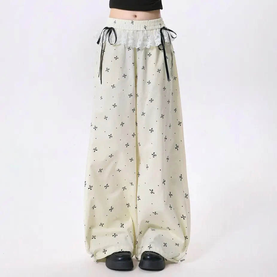 Damskie spodnie z kokardką ze słodką koronką koreańskie Retro Casual modne spodnie patchworkowy wzór letni luźny elastyczny pas prosta nogawka