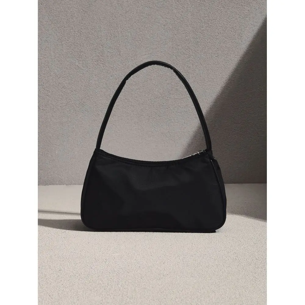 

Womens Handbag With A Square Design, Featuring A Textured, Minimalist, And Stylish Design For Shopping And Outings.