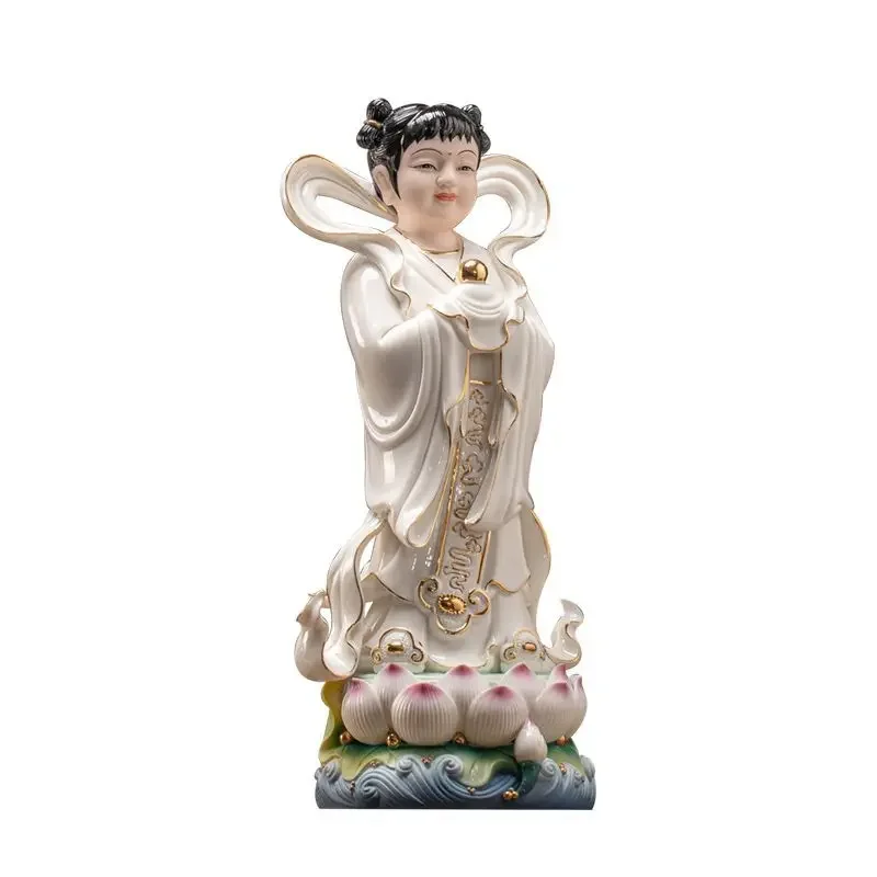 Ceramic ornaments, golden boy and jade girl Buddha statues are offered to serve in front of the household Buddha