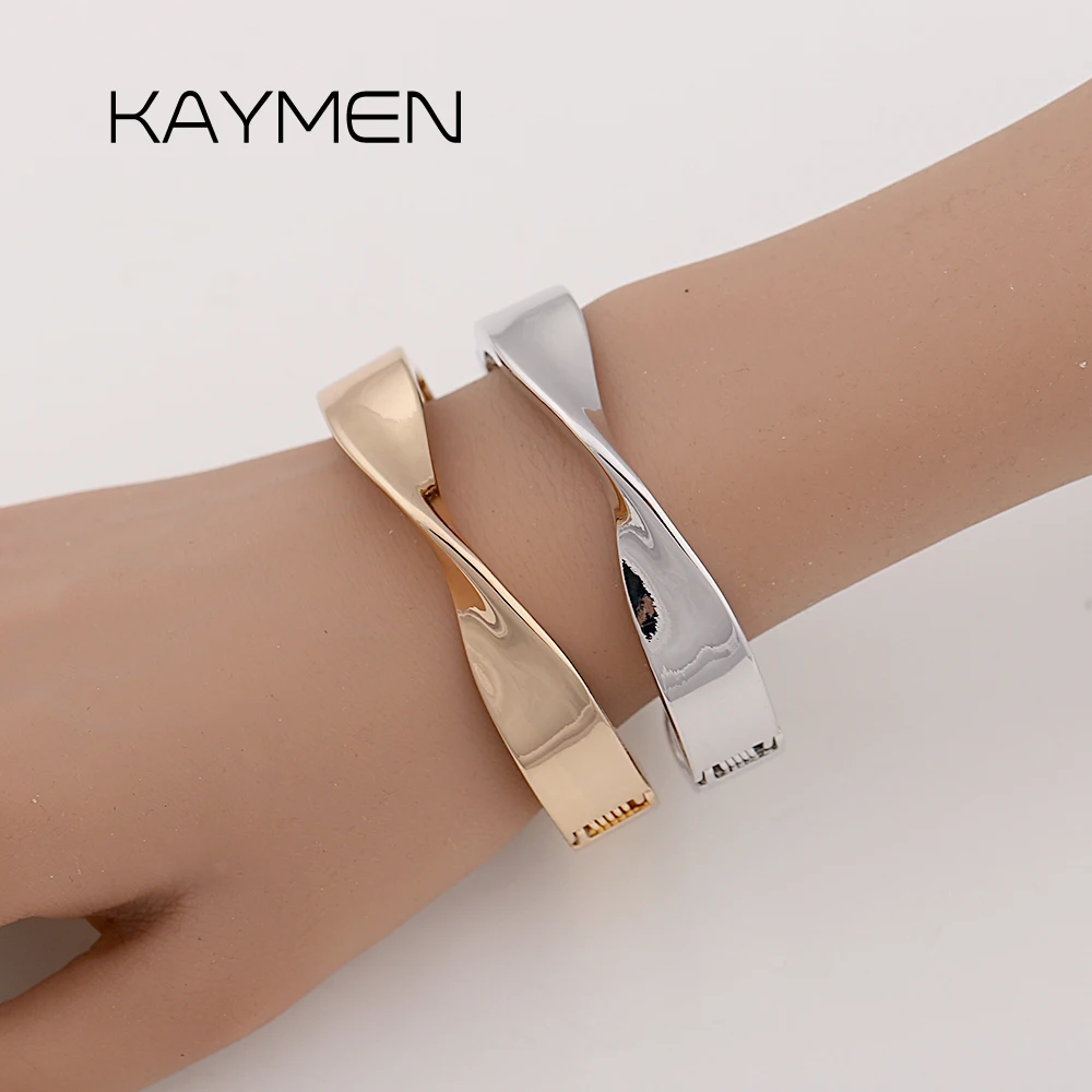 Elegant Gold Asymmetric Bangle Delicate Bow Wave Design Women Trend Party Bracelet Jewelry Gift Fashion Modern Style Accessory
