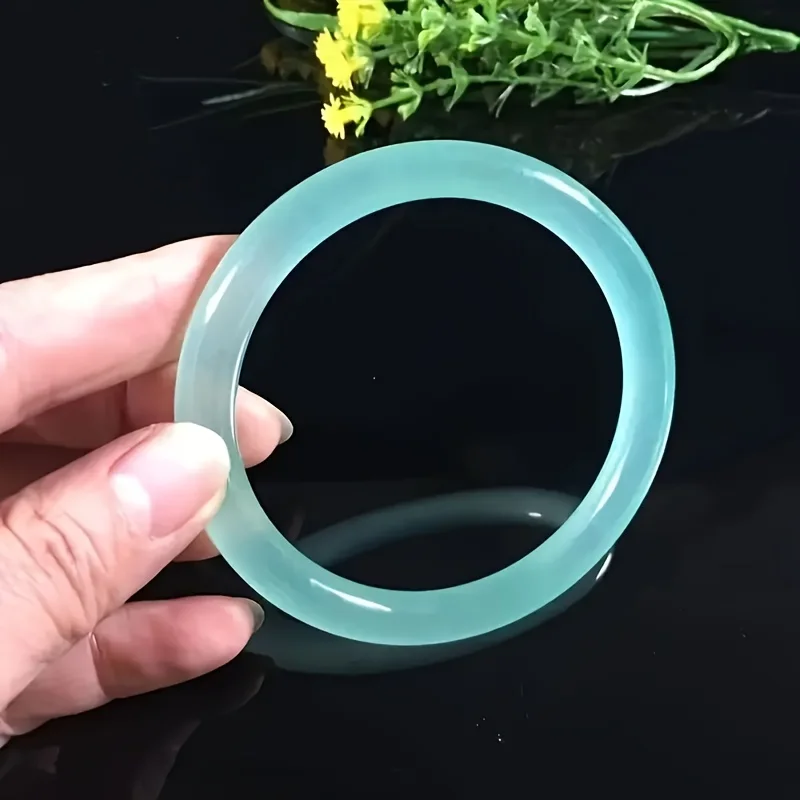 

Men's and Women's - Oval Turquoise Jewelry with Red Ribbon Detail