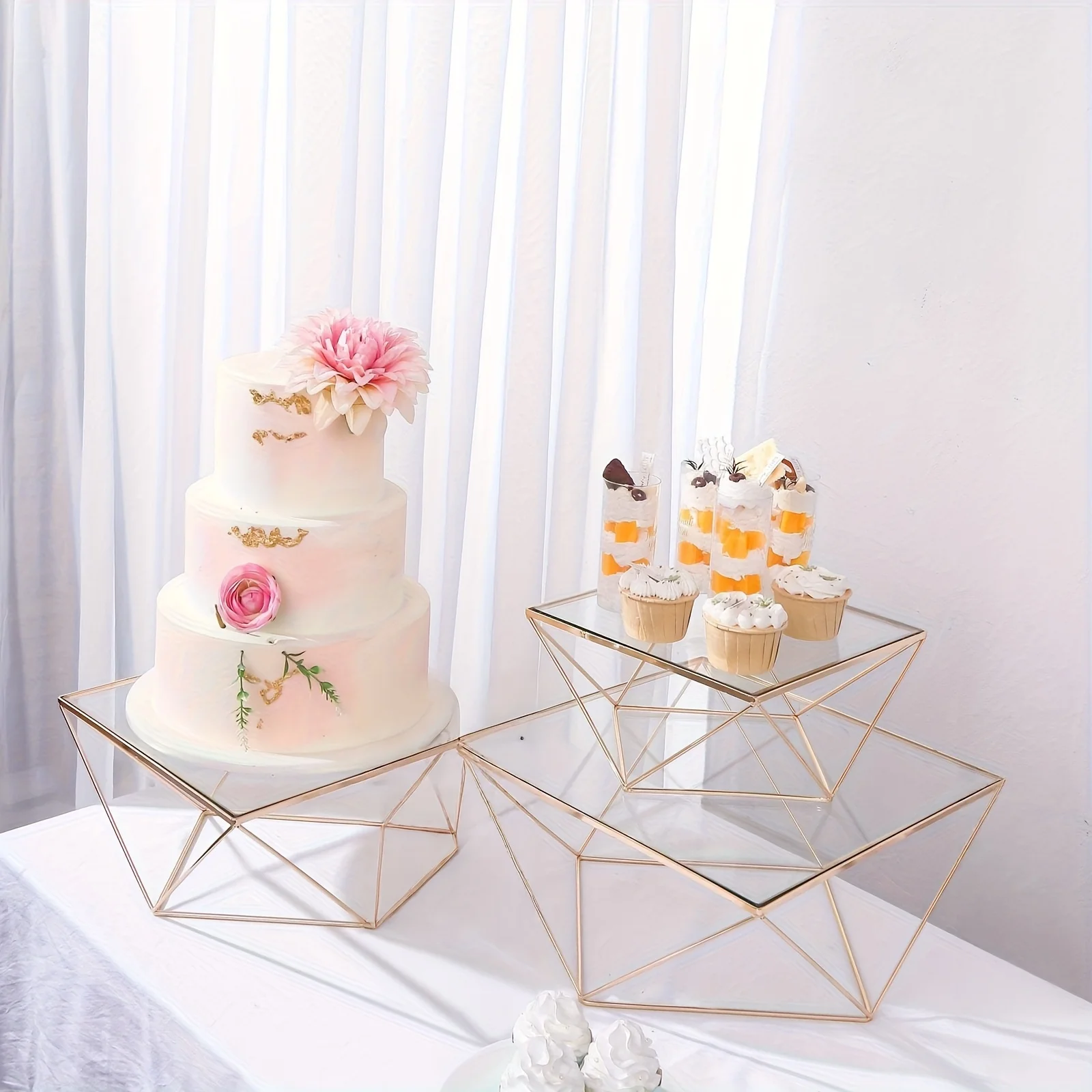 

Collection of Three | Golden Metal Geometric Stackable Dessert Stands with Square Plastic Tops, Available at a Local Warehouse,