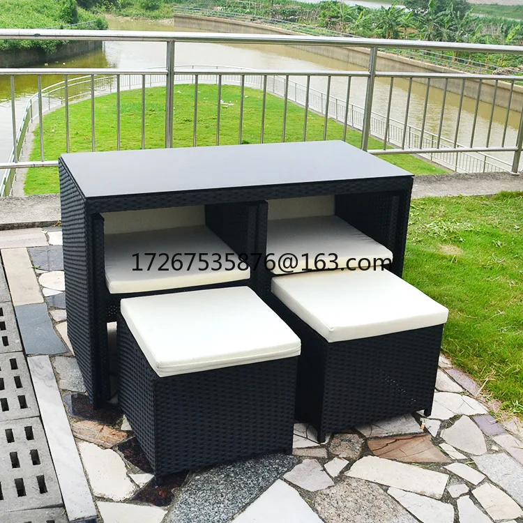 

Hotel restaurant rattan table and chair café rattan table and chair portable storage outdoor courtyard rattan table and chair