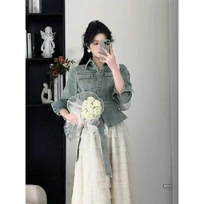 เสื้อแจ็คเก็ตยีนส์สไตล์ยุโรปและอเมริกาสำหรับผู้หญิง ดีไซน์เรโทรสุดหรู แฟชั่นใหม่สำหรับฤดูใบไม้ร่วง ทรงเอวสูง สายคาดบาง ถอดออกได้ แบบคาร์ดิแกน