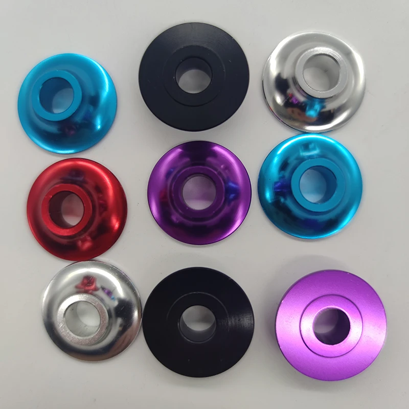 A pair of universal installation front wheel castor spacers and washers for sports wheelchairs, made of space aluminum alloy