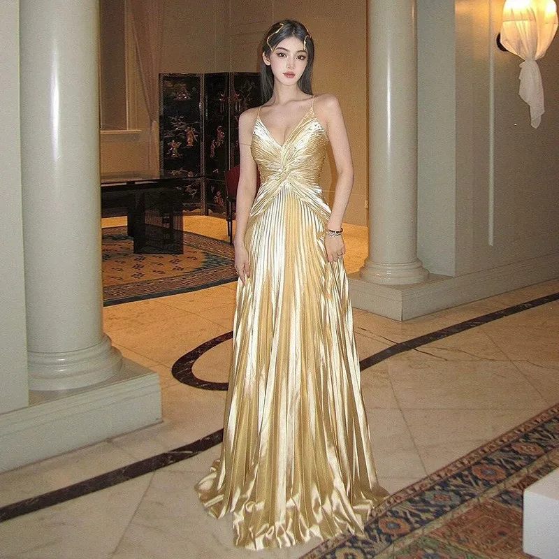 

Yellow halter top small cinched waist seaside backless dress