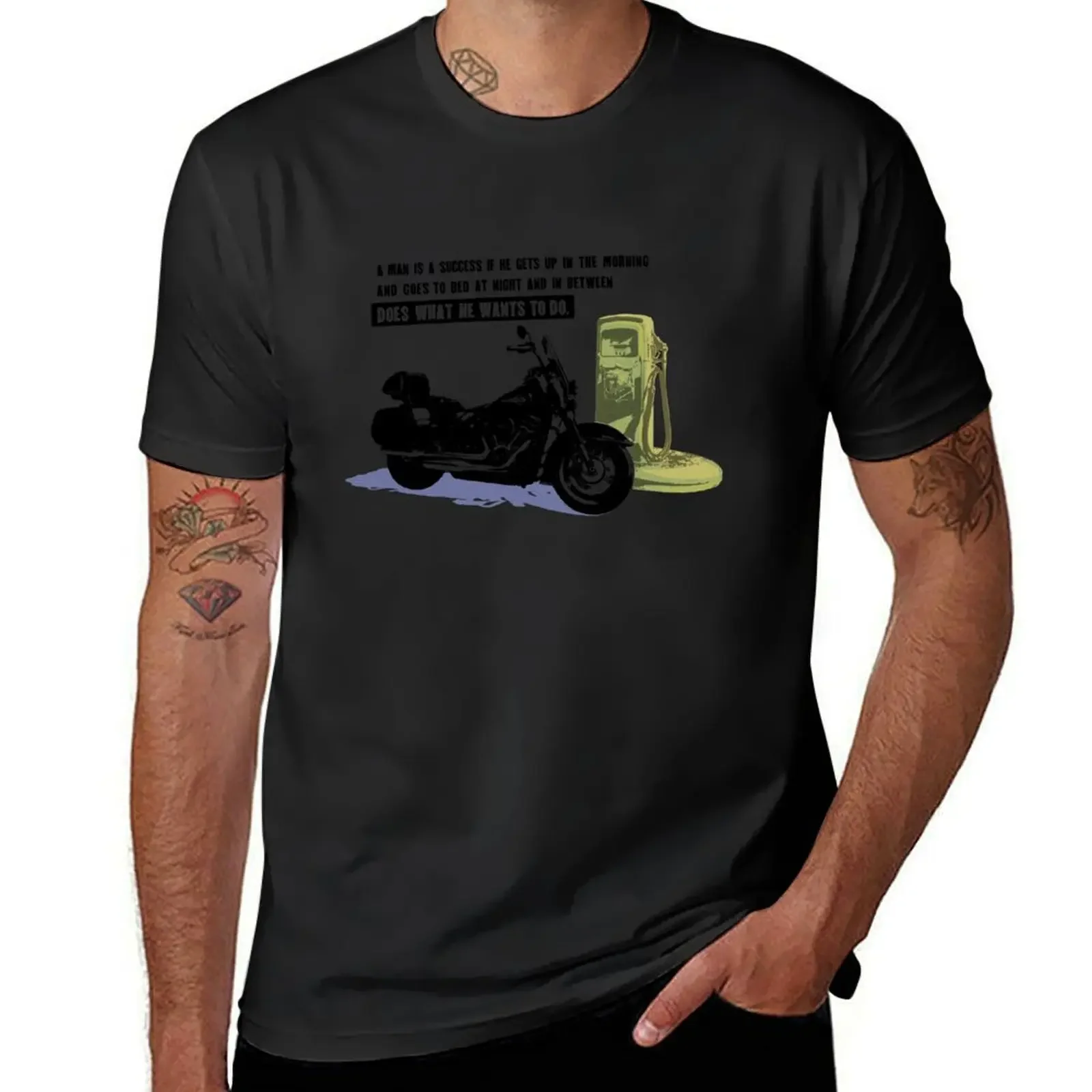 A Man is a success if he gets up in the morning and goes to sleep at night and in between does what he wants to do. T-Shirt