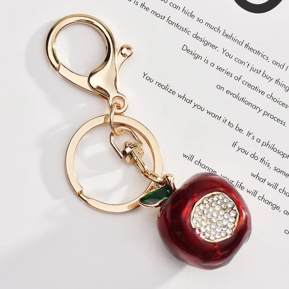 

Cute cartoon creative small gifts, alloy water diamond keychains, exquisite apple crystal keychain pendants