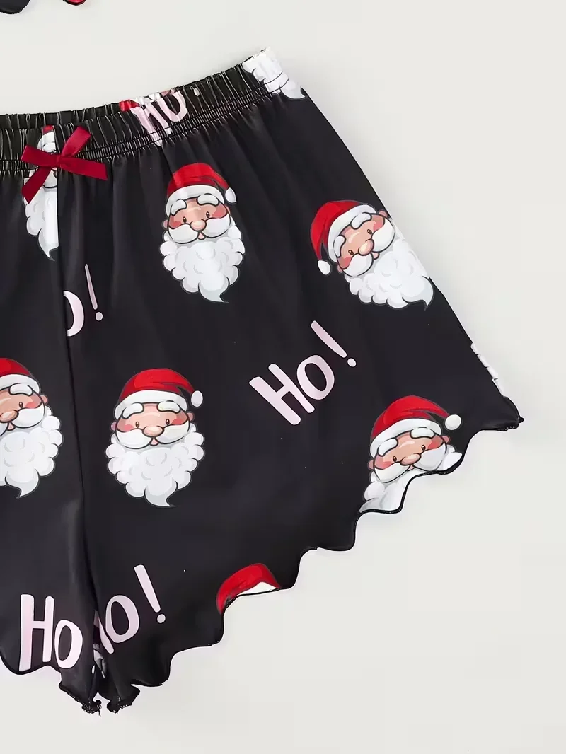 طقم بيجامة نسائي مطبوع عليه سانتا لعيد الميلاد مع حزام سباغيتي وسروال قصير برقبة دائرية بدون أكمام
