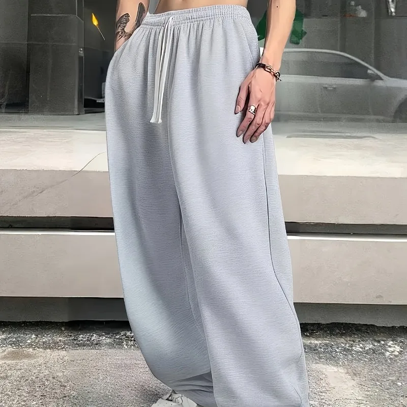 

Four Season Comfortable Casual Solid Color Pants Loose Fit Casual Jogging Pants Suitable for Both Men and Women Sports Pants