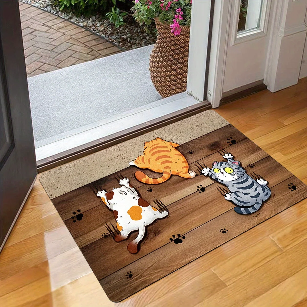 Cat: I won't fall! Durable and non slip entrance carpet for cat door mats, adding a playful charm to pet lovers' home decor