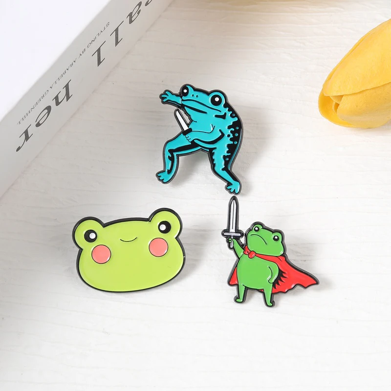 Frog With Knife Enamel Pins Custom Cloak Froggy Badge Cartoon Lapel Brooches Cute Animal Jewelry Gift For Friends
