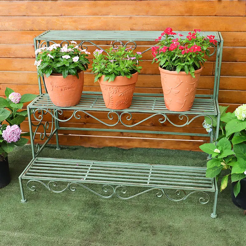 vintage aged horizontal stripe three-story iron bar staircase trellis balcony outdoor floor shelf succulent flower pot