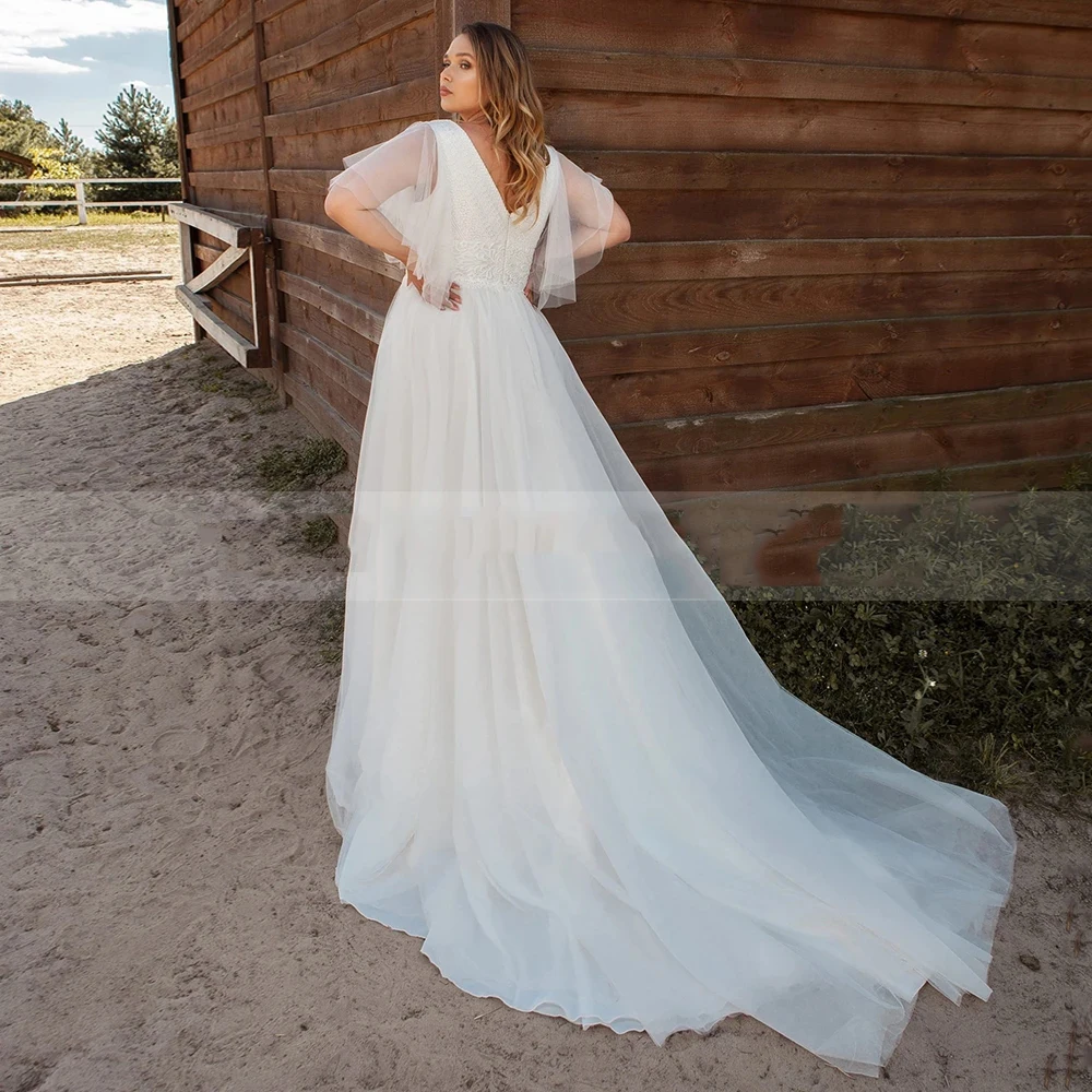 Precioso vestido de novia de manga esponjosa con cuello en V profundo, sin mangas, con apliques de cuentas, 2023