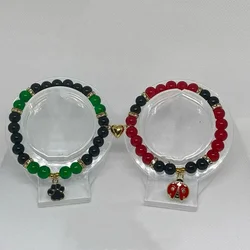 Handmade red and green bead bracelets with ladybug and cat footprints | Unique and charming themed bracelet | Gift for her