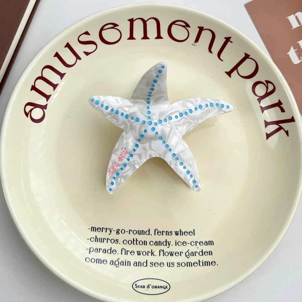 مخلب نجم البحر: نمط ترفيهي بحري وفريد من نوعه، مصنوع يدويًا من مادة الأسيتات عالية الجودة، وتجسيد الموضة والتري