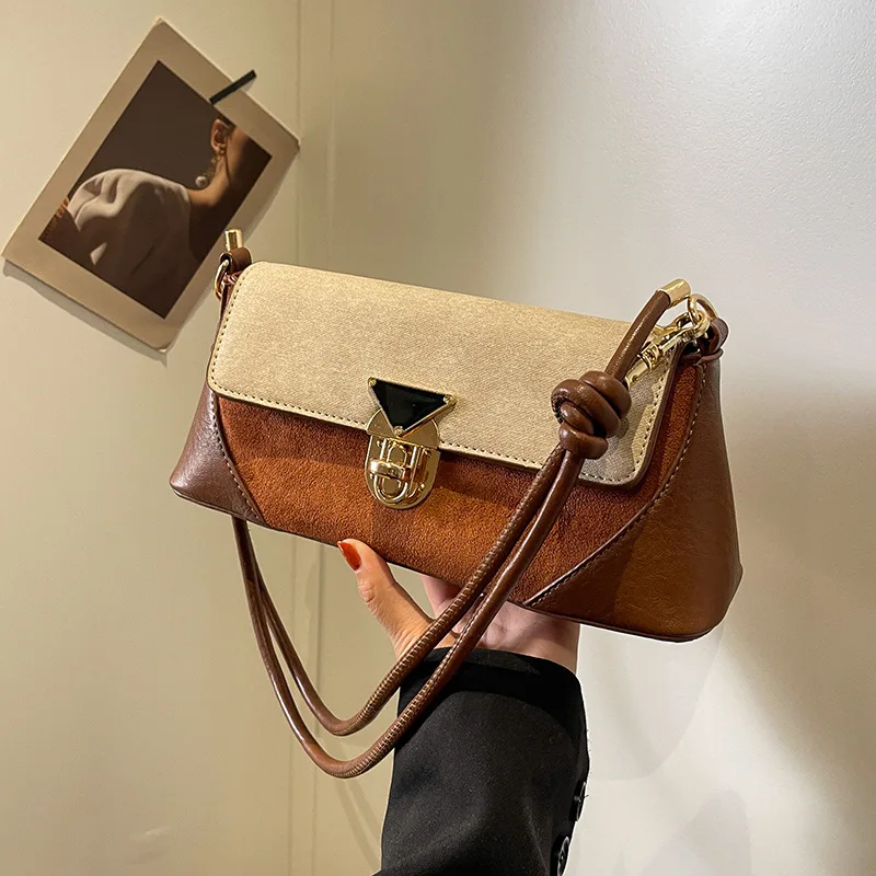 

Small niche design patchwork handbag for women 2026 new popular versatile crossbody bags shoulder armpit bag French stick bag