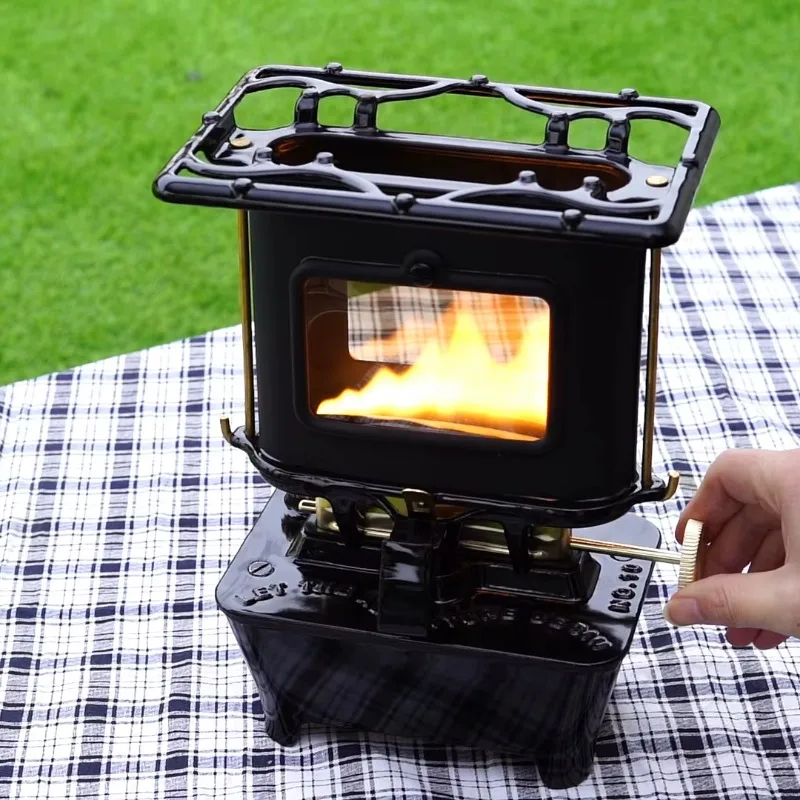 Stainless steel tent stove with glass for outdoor and indoor warmth, tea making, lighting