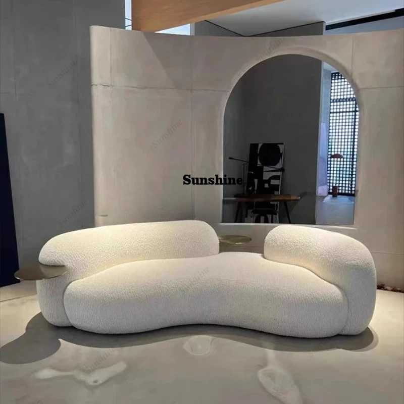 

Cream wind creative curved sofa light luxury Italian minimalist pea small apartment guest leisure lamb wool fabric sofa