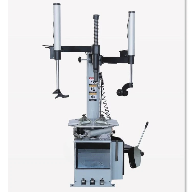 Машина для разборки и сборки автомобиля. Машина для снятия шин с двойным вспомогательным рычагом влево и вправо.